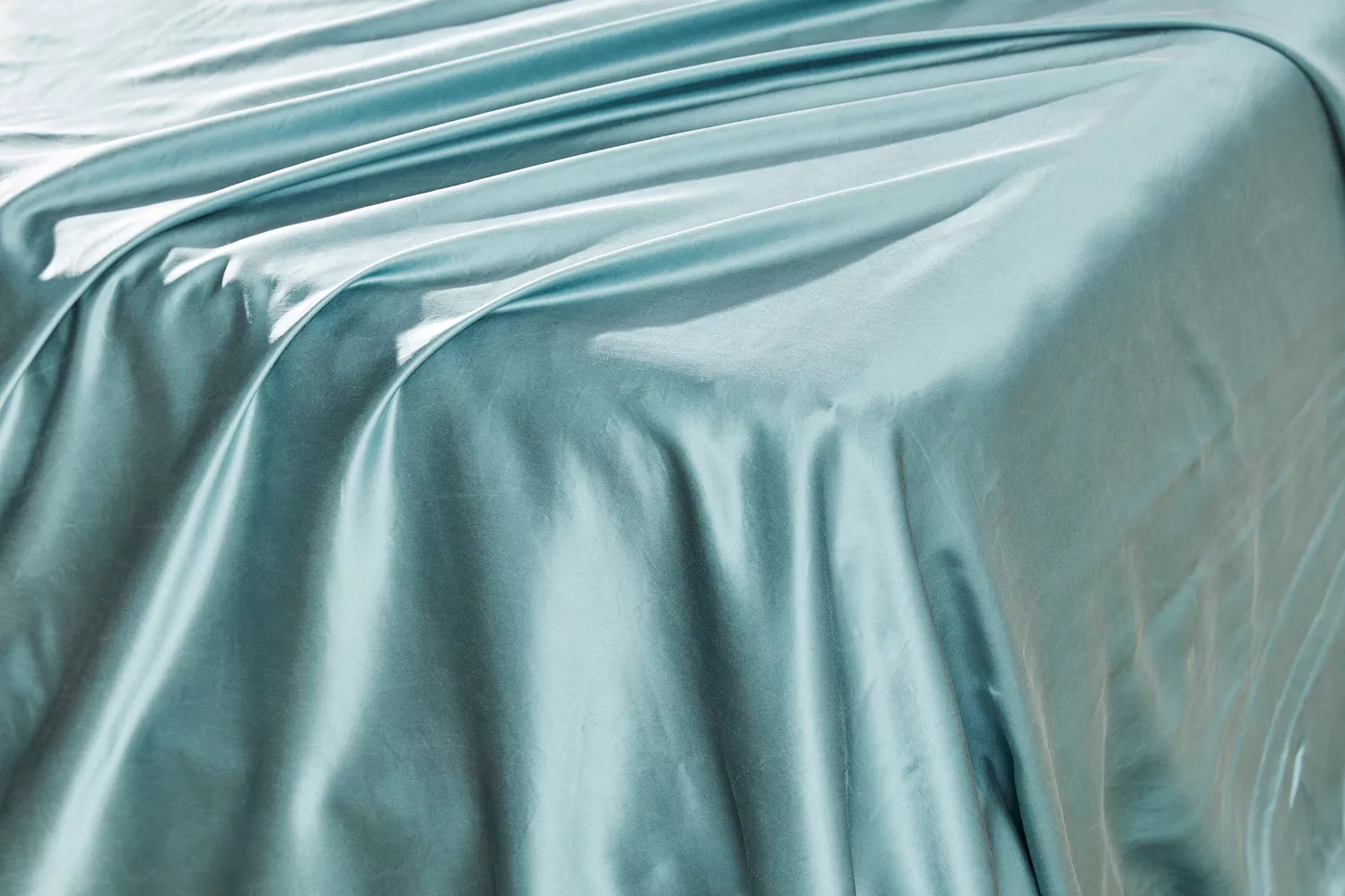 Colorado Home Co. Mulberry Silk Bed Sheets Set spread on the corner of a bed