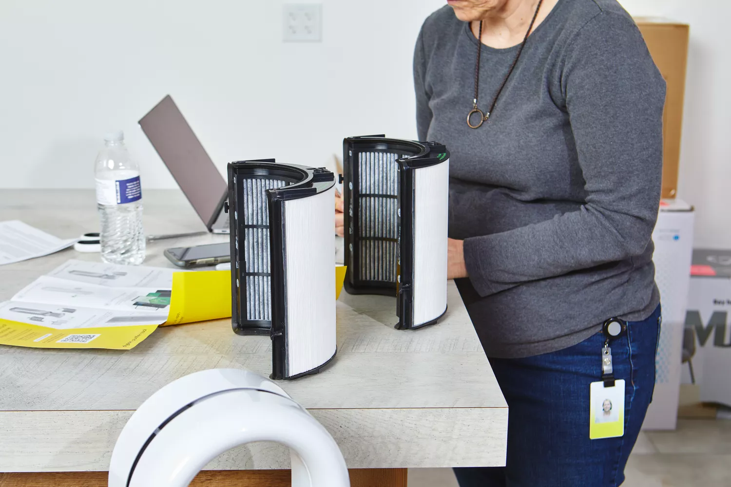 Person fixing the panel of Dyson Purifier Cool Purifying Fan TP07